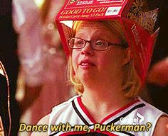 a woman wearing a box on her head with the caption dance with me - puckerman?