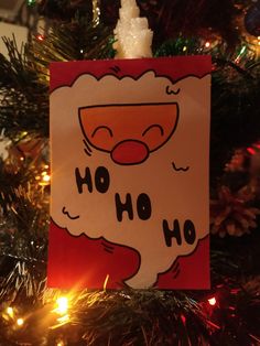 an ornament hanging from a christmas tree that says ho hoo on it