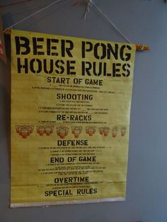 a sign hanging on the wall that says beer pong house rules