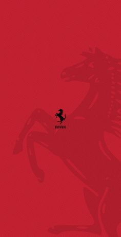 a red book cover with a black horse on it