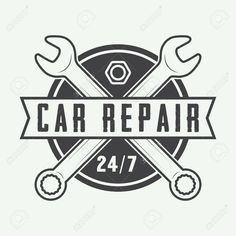 car repair emblem with two wrenches and ribbon