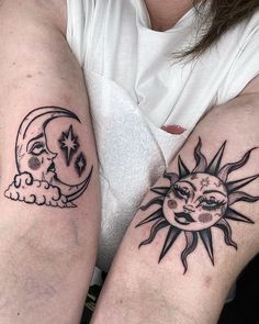 two sun and moon tattoos on both arms, one is black and the other is white