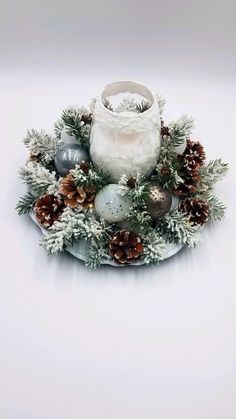 an arrangement of christmas decorations on a plate