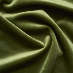 a close up view of a green fabric