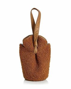 Elizabeth and James Women's Bag French Fry Teddy Small Bucket Bag Camel Shoulder strap. Magnetic closure; lined. Can be worn as a wristlet. 6"w x 3.5"d x 9"h; 5" strap drop. Polyester; trim: leather; strap: leather. Color: brown/Camel Elizabeth and James Women's Bag French Fry Teddy Small Bucket Bag Camel Brown Top Handle Pouch For Shopping, Brown Bucket Bag For Fall On-the-go, Brown Fall Bucket Bag For On-the-go, Fall Brown Bucket Bag With Detachable Handle, Brown Rectangular Pouch With Detachable Handle, Brown Leather Handle Pouch, Brown Handheld Pouch With Detachable Strap, Handheld Brown Phone Bag With Adjustable Strap, Brown Handheld Phone Bag With Adjustable Strap