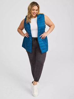 FIT Model is 5'9” wearing size 1. Measures 32” from shoulder (size 2). MATERIALS + CARE Cotton-blend fabric. . 100% nylon. Machine wash cold. . Imported. DETAILS Collared neckline. . Sleeveless. . Zip front. . The best plus size women's light packable puffer vest vests in blue opal made of nylon. Torrid is your destination for cozy fall and winter clothes to keep you warm and comfortable. Winter Puffer Vest, Black Dating, Casual Outerwear, Casual Vest, Long Torso, Puffer Vest, Shopping Day, Cozy Fall, Puffer