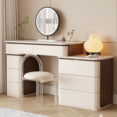 a white dresser with a mirror and stool next to it