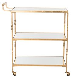 a gold metal and glass bar cart with two shelves on each side, one shelf is empty