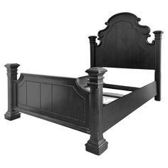 a black bed frame with an ornate headboard and foot board on the bottom end