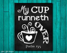 a chalkboard sign that says, my cup runneth and has a heart on it