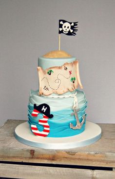 a birthday cake with a pirate theme on it