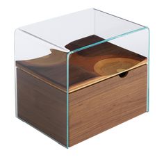 a wooden box with a glass lid and wood inlays on the inside side