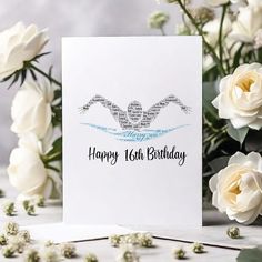 a card with the words happy 18th birthday written on it next to white flowers and greenery