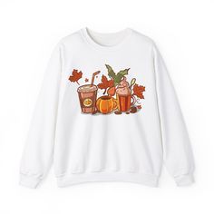 Get ready to embrace the fall season with our cozy Pumpkin Spice Latte sweatshirt! This comfy and stylish sweatshirt features a charming lineup of pumpkin spice latte cups and colorful autumn leaves, perfect for those crisp fall days. Crafted from soft, high-quality materials, this sweatshirt is perfect for lounging at home or running errands. Pair it with jeans, leggings, or your favorite fall accessories for a cozy and trendy look. This sweatshirt is a must-have for any coffee lover or fall enthusiast! Ideal for any situation, a unisex heavy blend crewneck sweatshirt is pure comfort. These garments are made from polyester and cotton. This combination helps designs come out looking fresh and beautiful. The collar is ribbed knit, so it retains its shape even after washing. There are no itc Pumpkin Latte, Coffee Lover Gift, Fall Days, Jeans Leggings, Fall Accessories, Fall Sweatshirt, Pumpkin Spice Latte, Coffee Lover Gifts, Fall Vibes