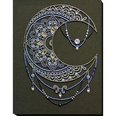 an intricately designed necklace and earring set is shown in this image from the video