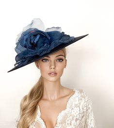 Navy Wedding hat, mother of the bride hat, navy blue Wide Brim Fascinator, Kentucky Derby Hat, Royal Ascot Hat, Derby Race Day Hat, luncheon This stunning navy blue large brim hat is decorated with a beautiful flower in the same shades. This blue hat is perfect for the Kentucky derby, Ascot races, weddings or any special occasion. Secure by headband. If you can choose the side of the head were you like to wear the fascinator, can send me a mail. ** PROCESSING TIME: 5 -7 business days. ** DELIVER Mother Of The Bride Blue Hats, Luxury Blue Headpieces For Races, Navy Formal Hat With Curved Brim, Navy Curved Brim Formal Hat, Elegant Navy Wide Brim Hat, Elegant Navy Hats With Curved Brim, Elegant Navy Hat With Curved Brim, Fitted Navy Wide Brim Hat, Navy Fitted Wide Brim Hat