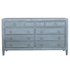 an image of a blue dresser with drawers