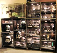 a display case filled with star wars memorabilia