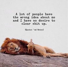 a lion laying on top of a rock next to a quote that says not giving a fock is better than revegege