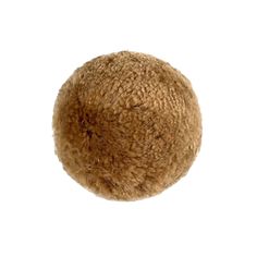 a brown ball is shown against a white background