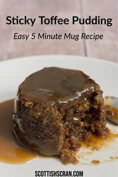 sticky toffe pudding on a white plate with caramel sauce