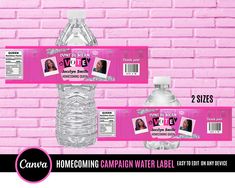 two water bottles with labels on them sitting against a pink brick wall