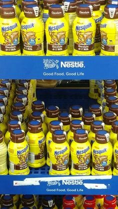 shelves filled with bottles of nestle's good food good life product in a store