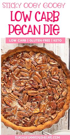 a pecan pie sitting on top of a wooden table with text overlay that reads sticky goody low carb pecan pie