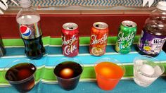 there are many different types of sodas on the table