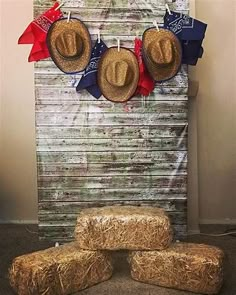 three straw bales stacked on top of each other in front of an american flag