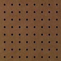 a piece of cardboard with holes on it