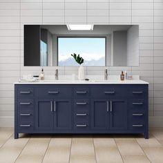 a bathroom vanity with two sinks and a large mirror over the sink, in front of a window