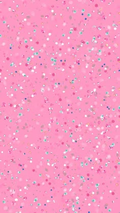 a pink background with lots of small dots