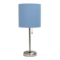 a lamp that is on top of a metal base with a blue lampshade