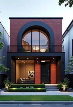 a modern house with an arched window and brick facade, surrounded by greenery in the front yard