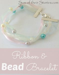 the bead bracelet is made with ribbon and pearls