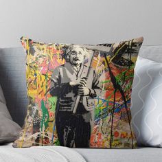 a man holding an umbrella in front of graffiti on the wall throw pillow by artfuls