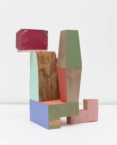 colorful wooden blocks stacked on top of each other