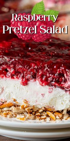 raspberry pretzel salad on a white plate with the words, raspberry pretzel salad