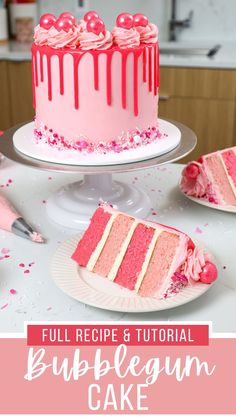 a pink cake sitting on top of a white table