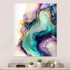 an abstract painting on the wall in a living room