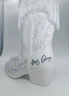 An amazing and original choice to make a statement for parties, daily, weddings, country side music festivals, line dancing, western theme parties, rodeo, or shopping these Customized 2.5-inch heels and classic western embroidery cowboy boots for women's design show elegant Western style. Soft synthetic leather lining wicks away moisture and offers a comfortable next-to-skin feel and cushioning to give feet comfort. Mid-calf cowgirl boots for women are designed with western embroidery, side zipp Wedding Shoes Cowgirl Boots, Disco Cowgirl Wedding, Boho Bride Shoes, Boots And Bling Party Theme, Shoes For Wedding The Bride, Bedazzled Cowboy Boots, Cowboy Theme Wedding, Bachelorette Shoes, Bride Cowboy Boots