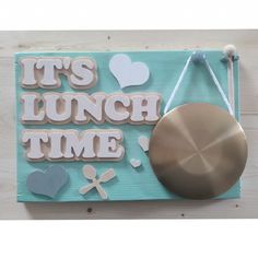 it's lunch time sign with cookie cutters and other items on the board