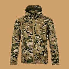 a camo jacket with hood and zippers on the chest, in front of a tan background