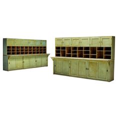 two wooden storage cabinets with open doors