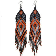 Long 5" Beaded Fringe Earrings Black And Orange Dangle Tribal Statement Jewelry Black And Orange Reddish Orange Approx 5.5" Also Available In Other Colors, Listed Separately In My Closet / Shop. New Most Of My Other Earrings Are Dangle Types Like These That Can Be Upgraded To Solid Sterling Silver Or 14k Gold Filled Wires So If You Have Sensitive Ears Like Me, Check My Other Listings. I Have A Jewelry Design Background In Nyc. I Buy My Ear Wires From A Legitimate Metal Source Jewelry Supplies Co Orange And Black Beads Dangle Earrings, Orange Dangle Beaded Earrings With Black Beads, Orange Dangle Earrings With Black Beads, Traditional Black Beaded Fringe Earrings, Traditional Black Beaded Earrings With Fringe, Bohemian Orange Beaded Earrings With Black Beads, Seed Bead Fringe Earrings, Bead Fringe Earrings, Beautiful Beaded Jewelry