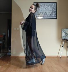 Sheer Chiffon Black Coctail Party Novelty Casual Summer Minamilist Muslin Kimono Jacket Cardigan. Boho Seaparates.Lenght: 45"Soft transparent material, very elegant and stylish.Washing methods : hand washMade with soft high quality tissues.SIZE - S - UK 8 - US 4/6 - EU 34SIZE - M - UK 10 - US 8/10 - EU 36SIZE - L - UK 12/14 - US 12 - EU 38/40SIZE-XL-UK 14-16-US 14-EU 42Hand wash in cold water, lay flat to dry Transparent Fashion, Sheer Clothing, Sheer Jacket, Asymmetrical Skirt, Sheer Chiffon, Personalized Clothes, Womens Robes, Kimono Jacket, Black Laces