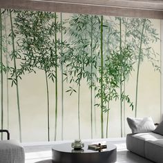 a living room filled with furniture and a painting on the wall next to a window