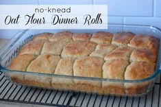 a glass baking dish filled with bread rolls