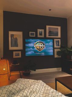 a flat screen tv mounted to the side of a wall